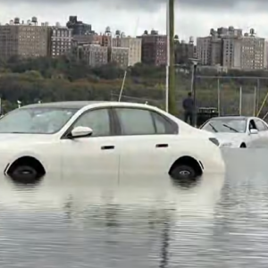 One of the cars that was flooded in the Edgewater parking lot.