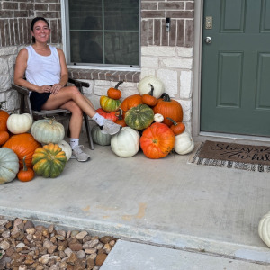 Brandi Hazelett with her pumpkin display.