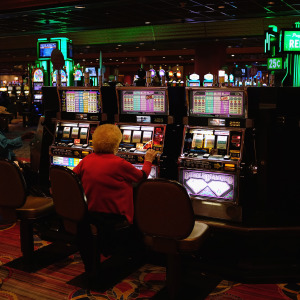 An elderly woman plays slot machines in a casino on the Atlantic City Boardwalk on in New Jersey.