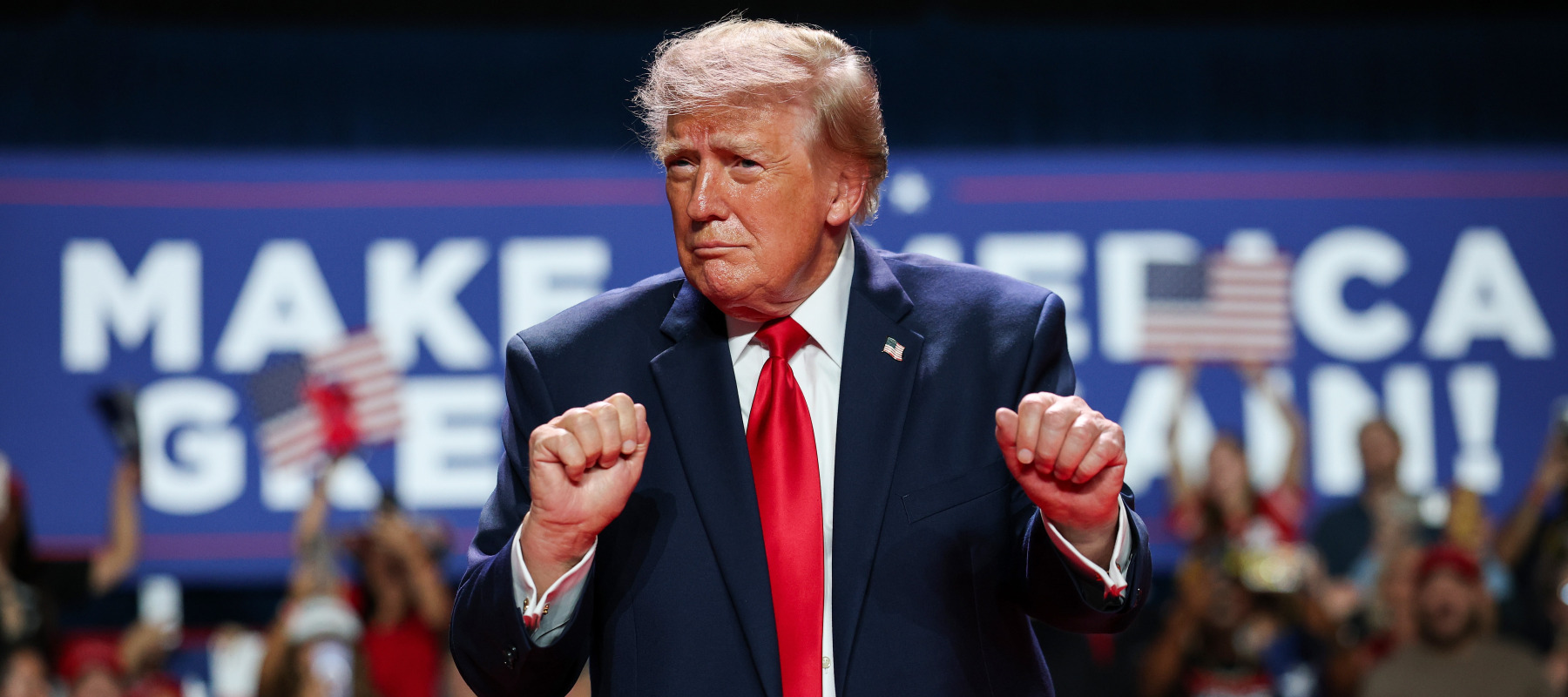 Trump dances as he leaves the stage after speaking during a campaign rally.