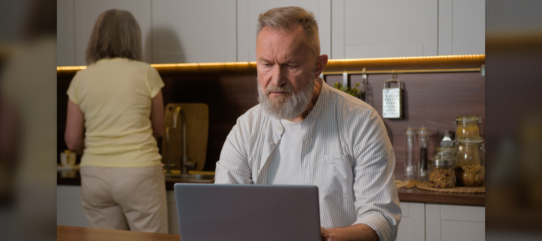 man and woman in kitchen