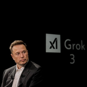 Elon Musk in front of Grok logo