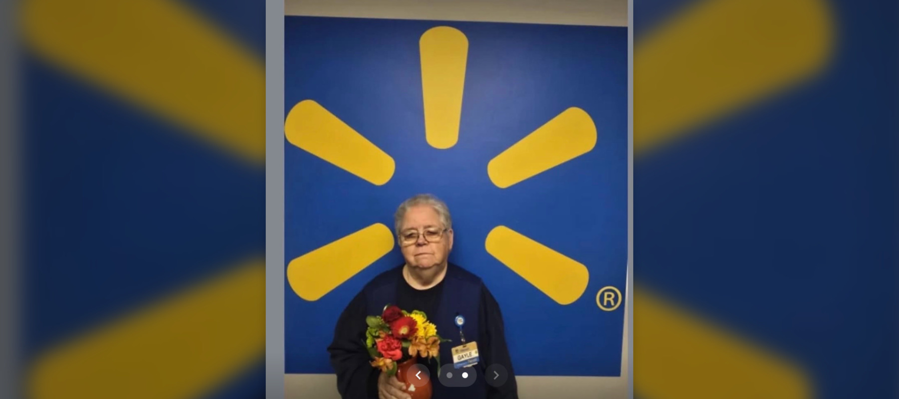 Kentucky Walmart employee posing with flowers