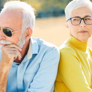Couple having a disagreement in a park.