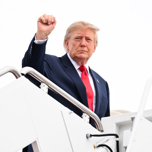 President Donald Trump boarding a plane.