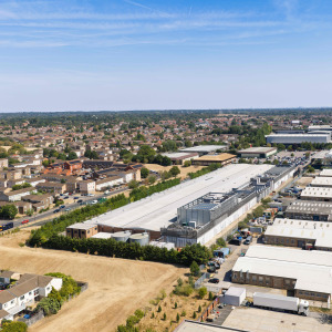 Sprawling industrial data center complex situated next to suburban housing