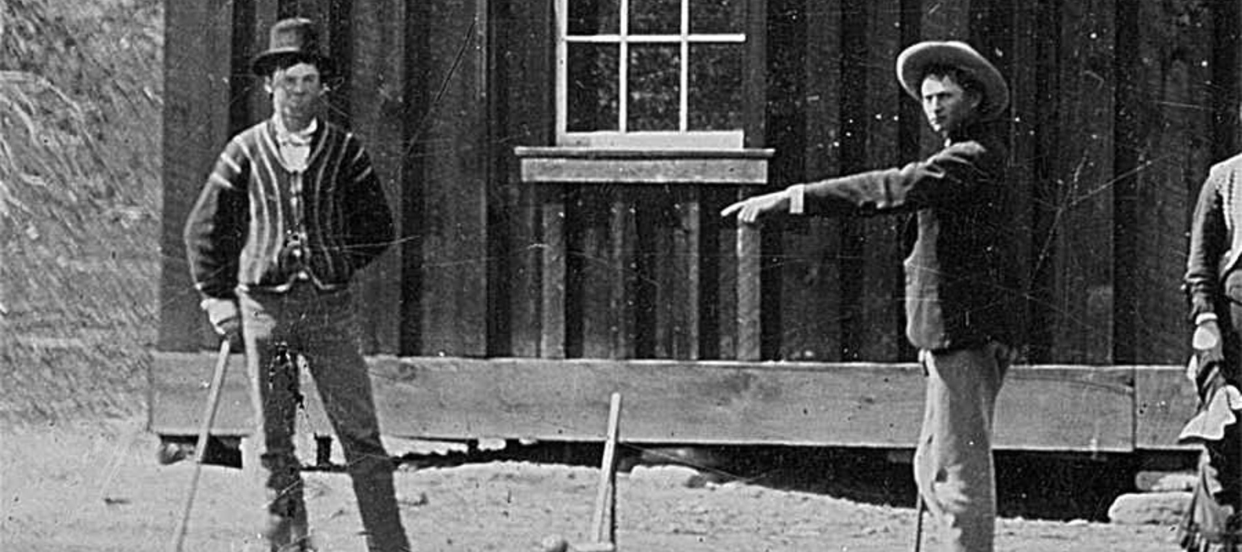 Billy the Kid (left), detail from a 4x5 photograph depicting him and a friend playing croquet in New Mexico, circa 1878.