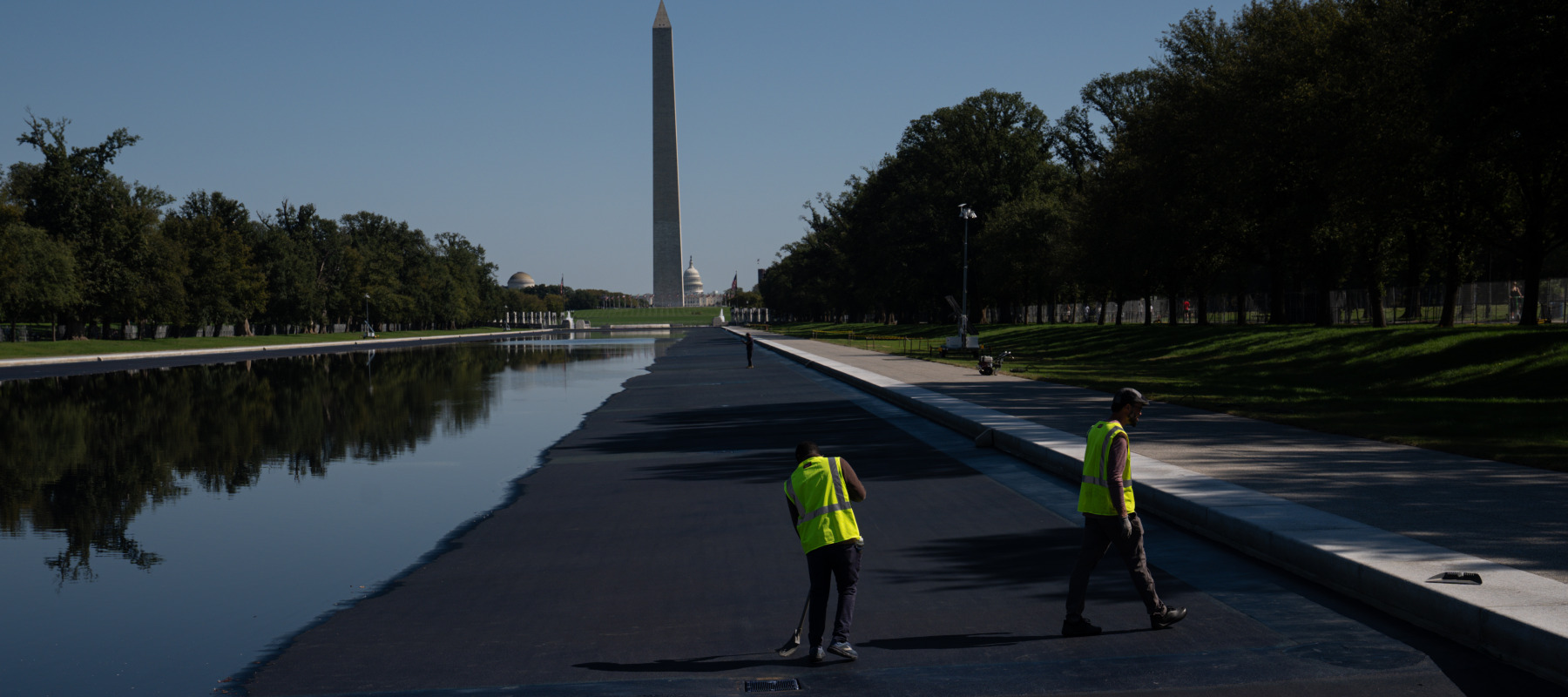 The Lincoln Memorial Reflecting Pool is partially filled with water as refilling work continues following renovation and repair work in Washington.