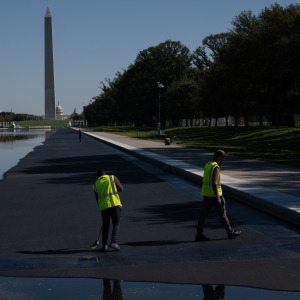The Lincoln Memorial Reflecting Pool is partially filled with water as refilling work continues following renovation and repair work in Washington.