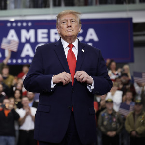 Donald Trump arrives for a campaign rally at the Menard Memorial Sports Center in Wasilla, Alaska.