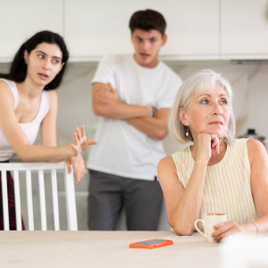 Adult children arguing with their mother.