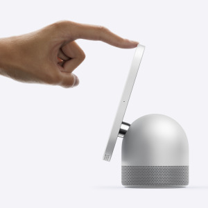 Two apple HomeViews pictured with a hand touching one of the screens.