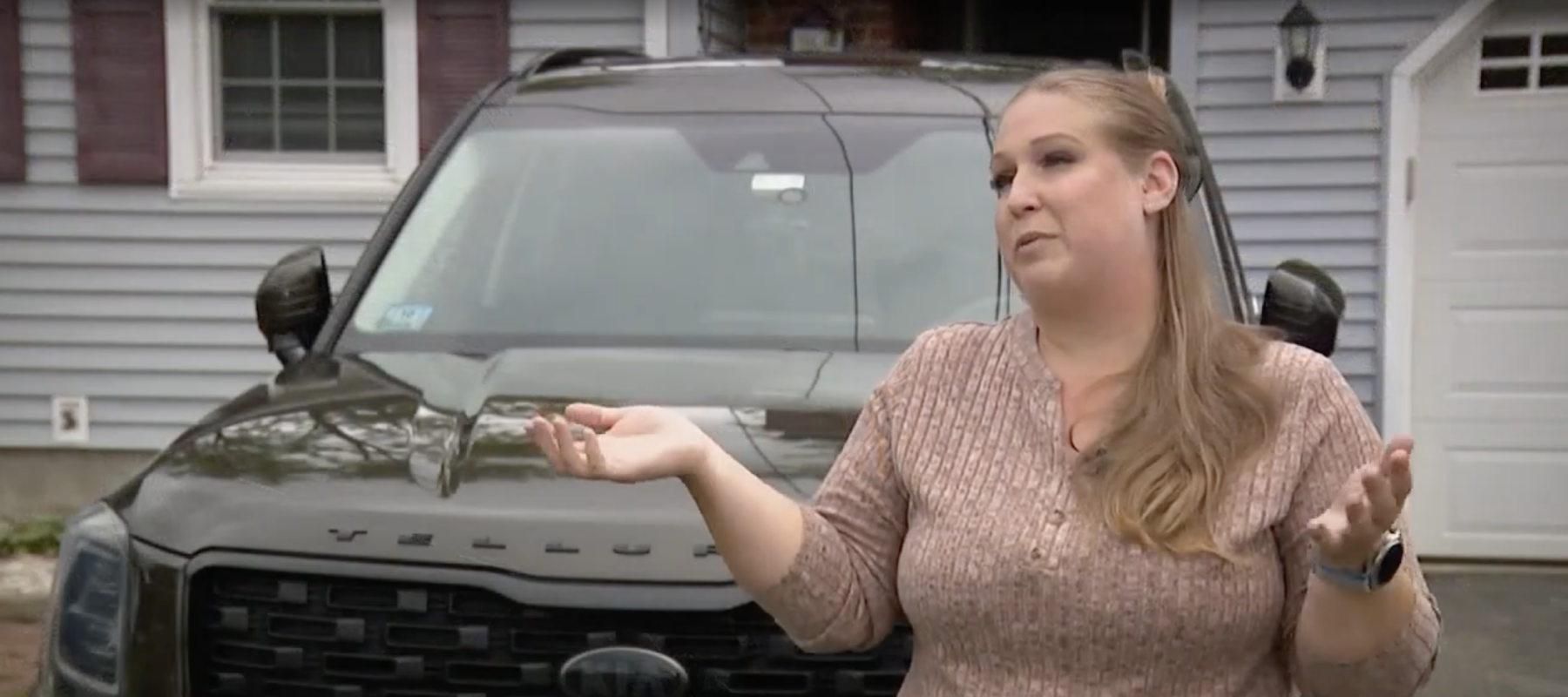 A photo of Amber Cichowski and her Kia
