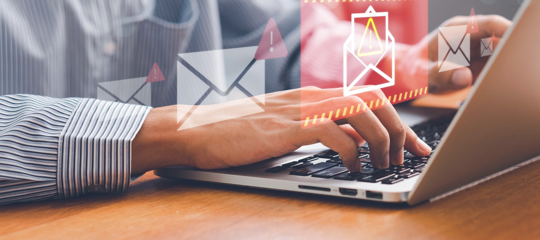 Person using computer receiving scam alert.
