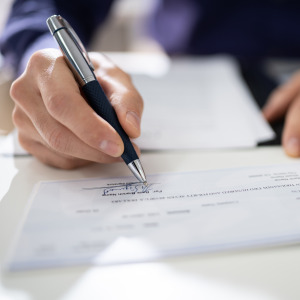A couple had bad checks coming out of their joint account for over a decade before they caught on.
