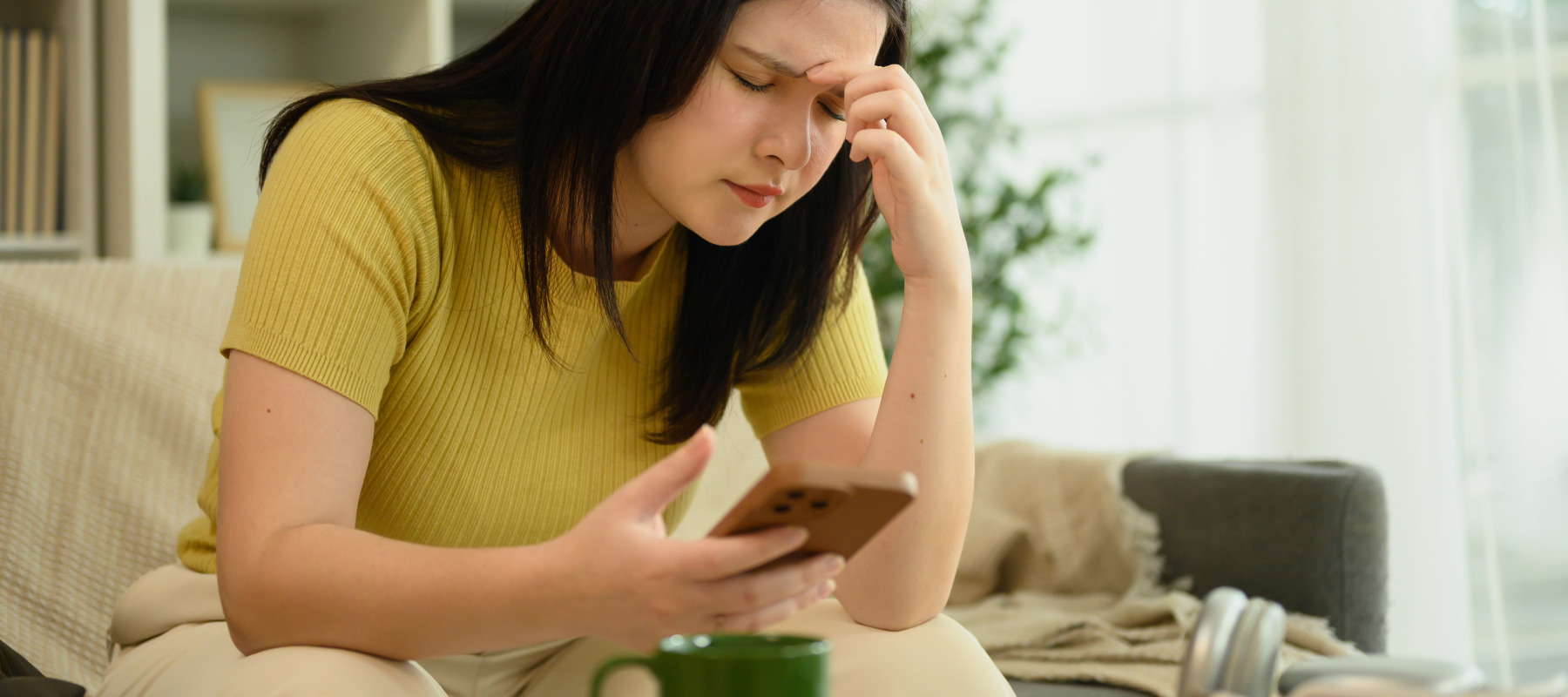 woman stressed on phone