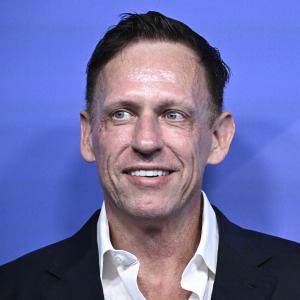 German-US entrepreneur, venture capitalist and conservative political activist Peter Thiel arrives on the red carpet for the Axel Springer Award in Berlin