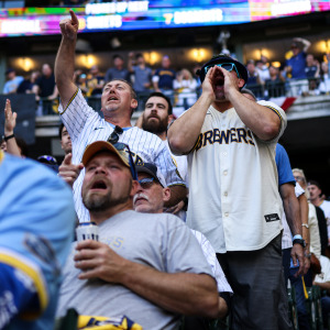 Milwaukee Brewers fans cheer during a game against the San Diego Padres.