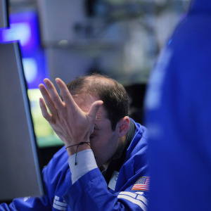 Traders work on the floor of the New York Stock Exchange during morning trading on Oct. 21, 2026.