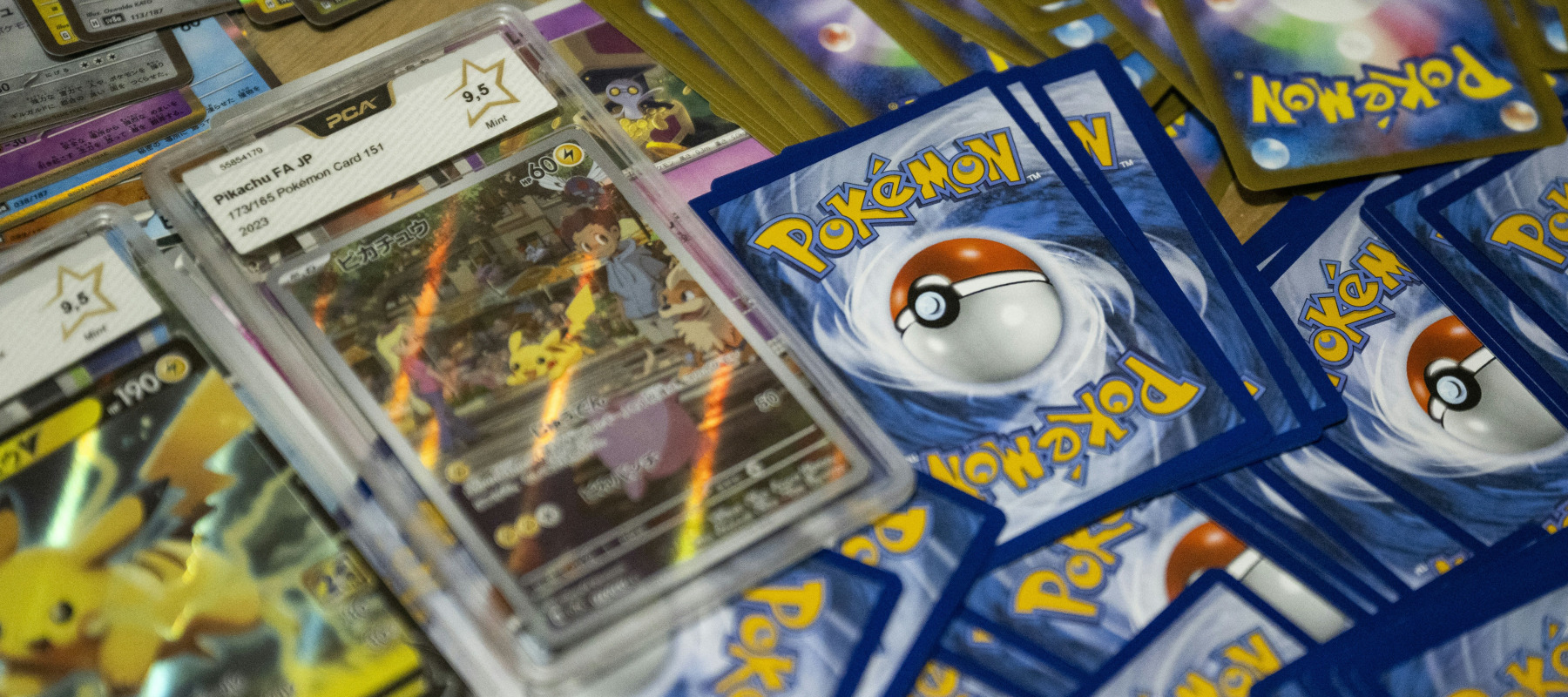 Cards from the Pokemon Trading Card Game (TCG) including mint rated cards featuring Pikachu graded by French card grading service PCA.