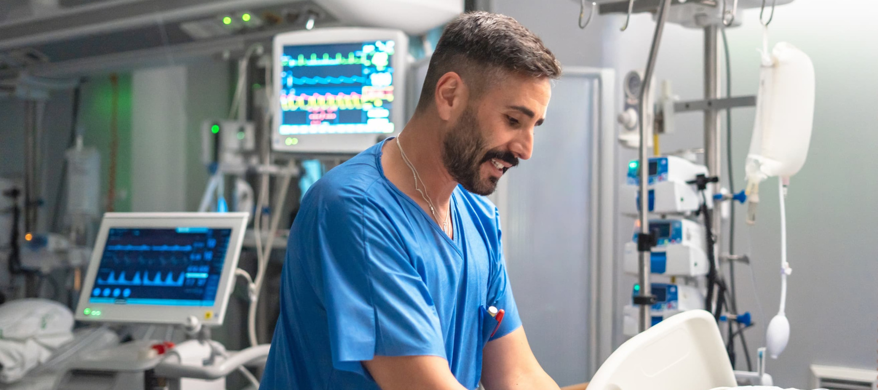 A photo of a nurse caring for a patient in a hospital