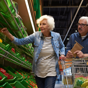 Senior couple buying groceries
