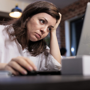 Student loan default can result in mail-related stress.
