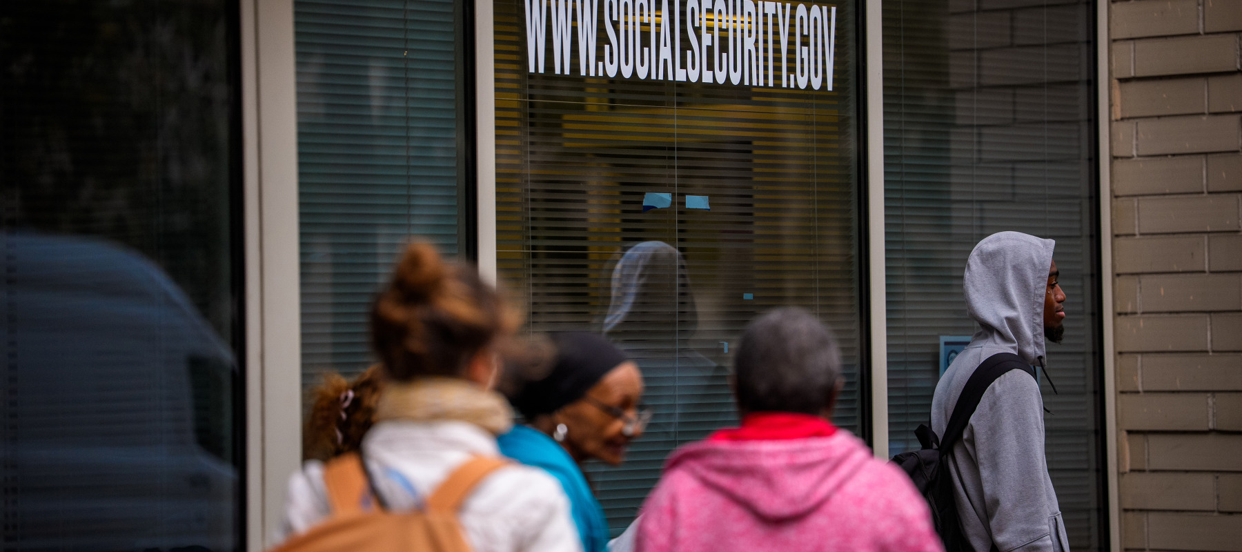 People line up outside a Social Security Administration office in Washington, D.C.