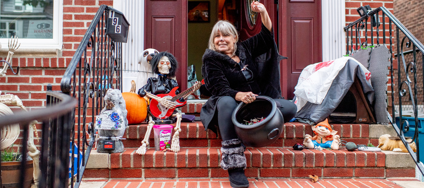 Residents give out candy as kids trick-or-treat in the Kensington neighborhood in Brooklyn.