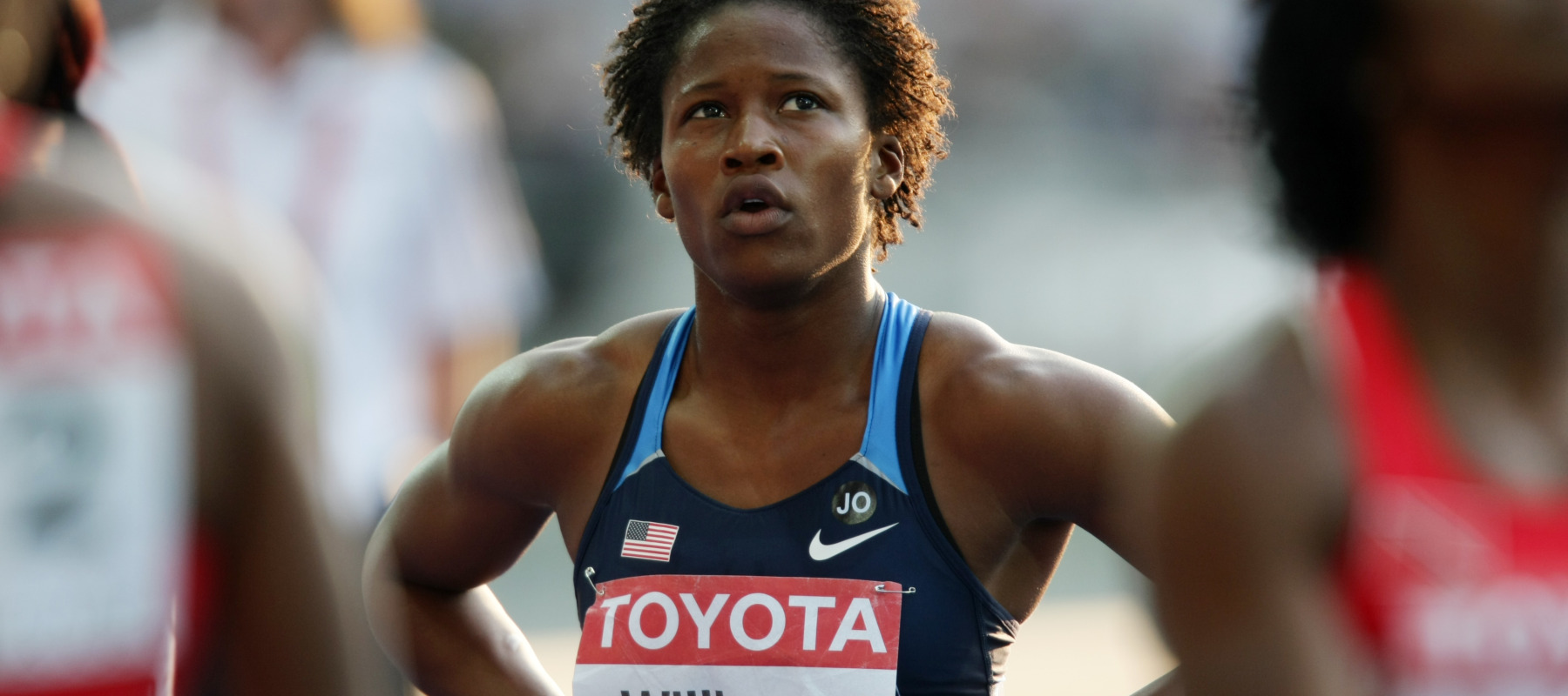 American sprinter Lauryn Williams takes a breather during the women's 100-metre final competition.