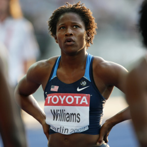 American sprinter Lauryn Williams takes a breather during the women's 100-metre final competition.