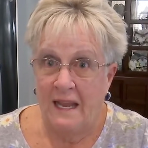 The Magnolia Cove HOA has increased fees on home owners like Jill Menson, right.