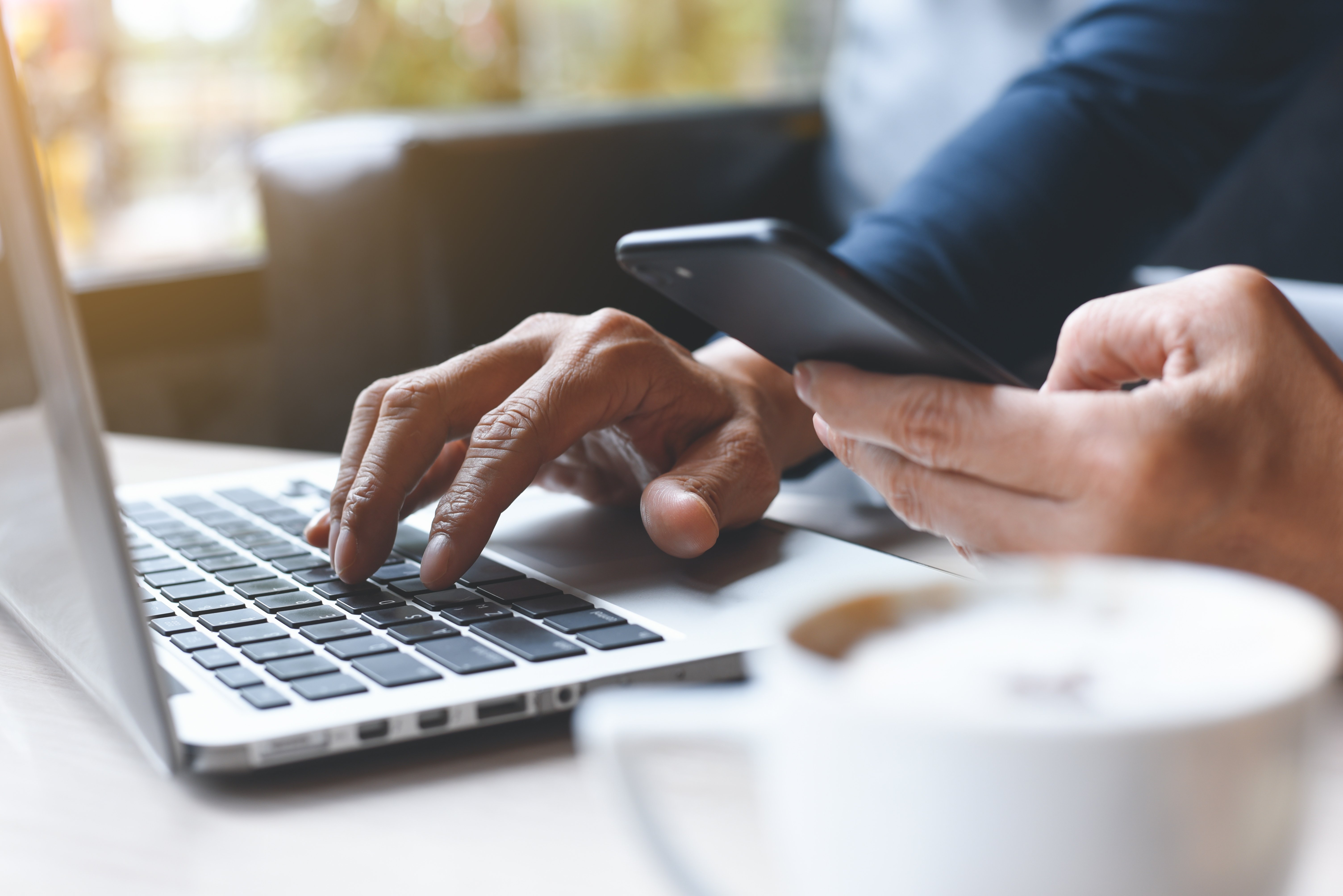 Man doing online banking on his laptop