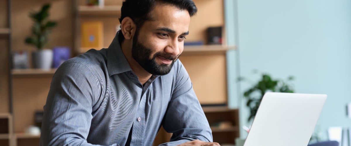 Man looking at laptop