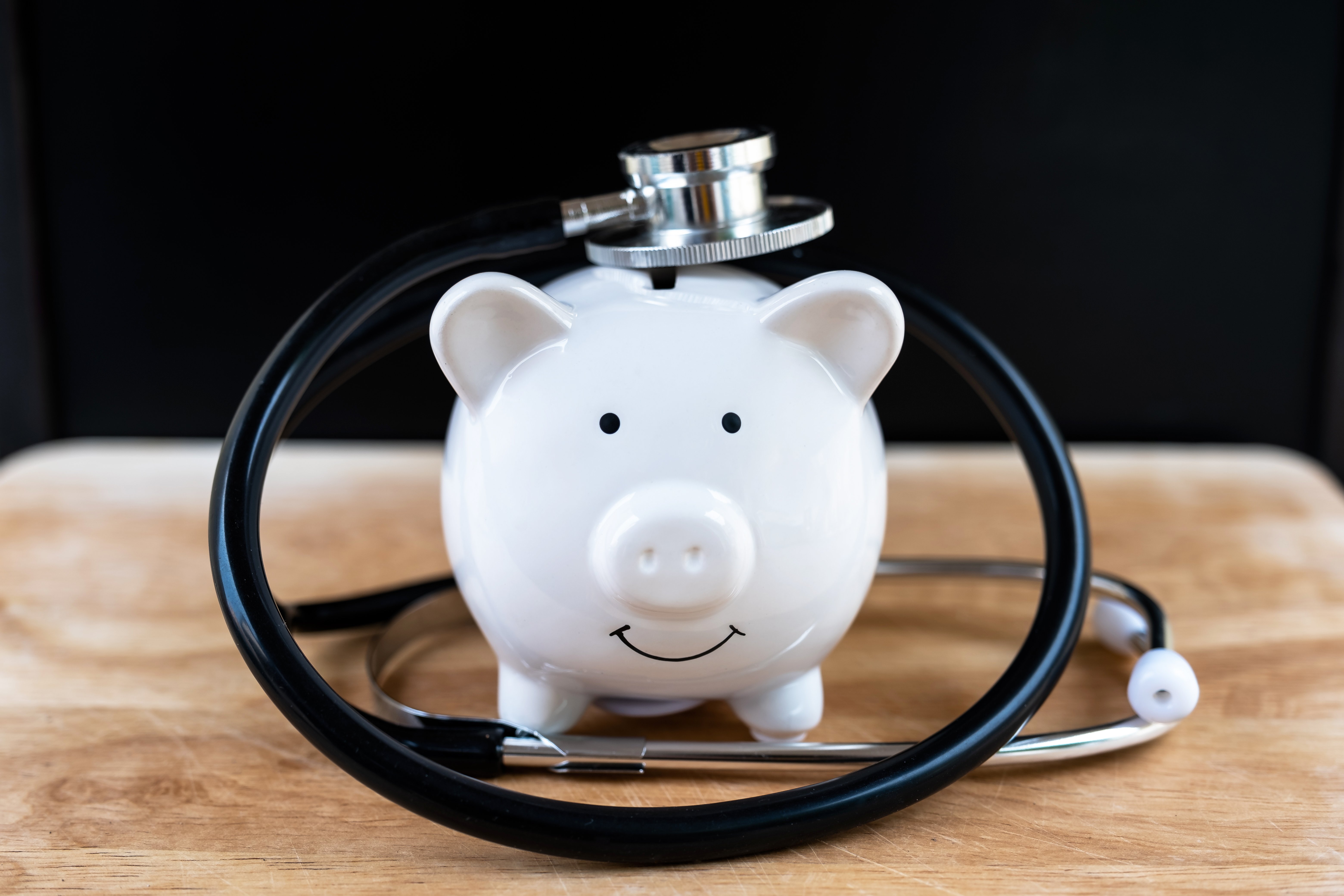 Piggy bank with stethoscope