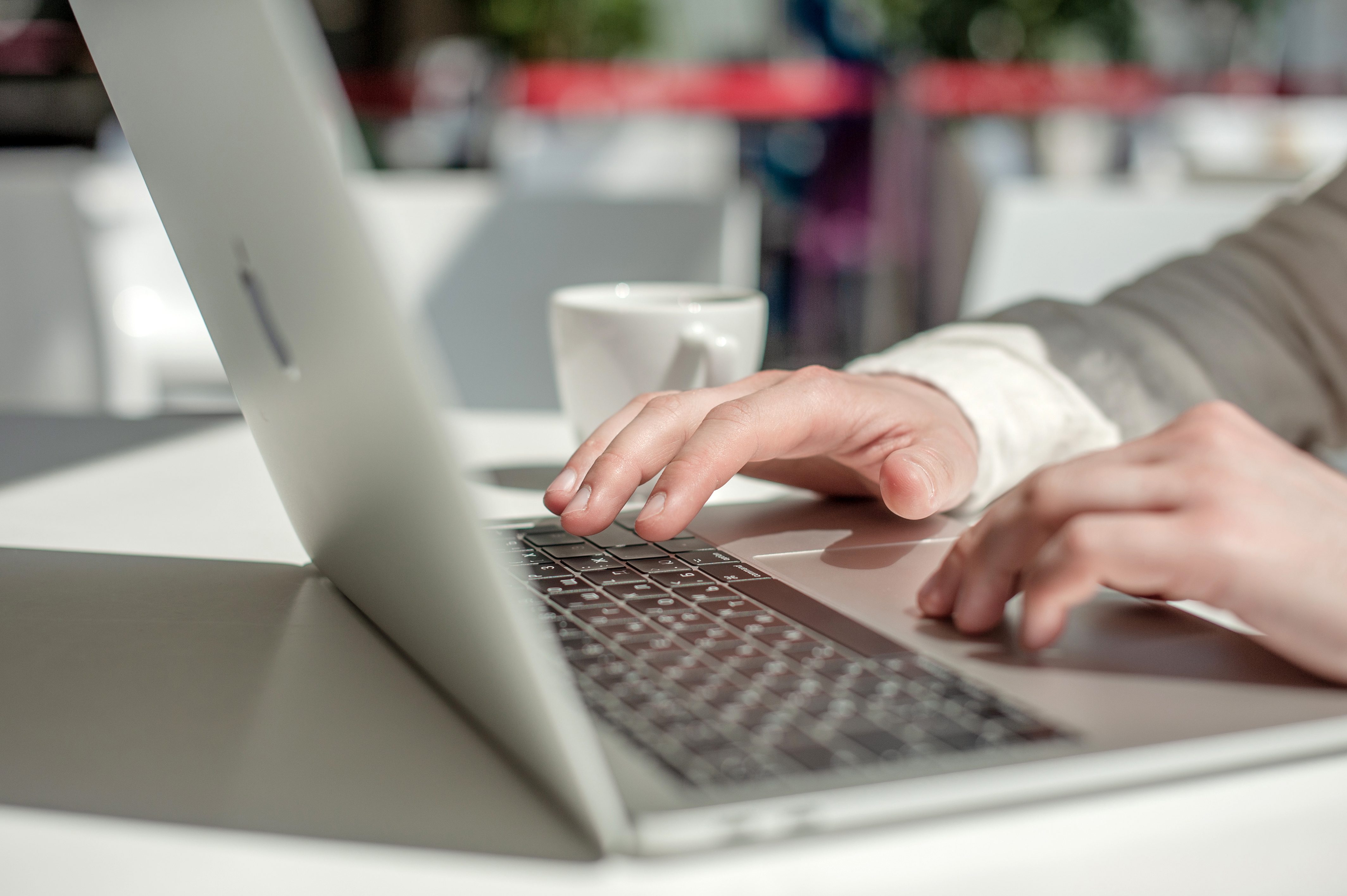 Man using Apple MacBook Pro Retina 2017 13.3 and Apple iPhone 7 Plus