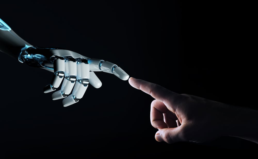 Robot hand making contact with human hand