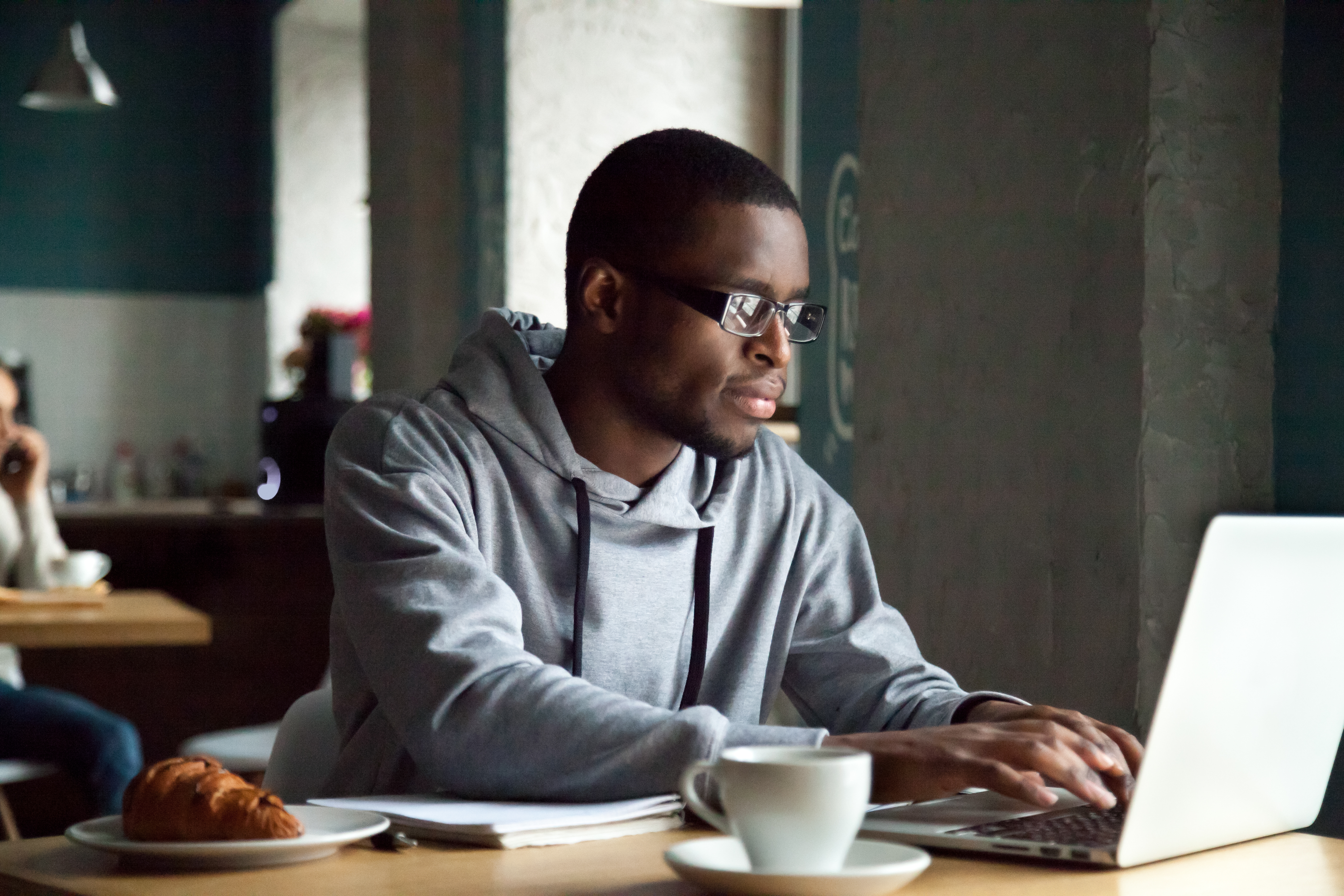 Person looking at their investment on a laptop.